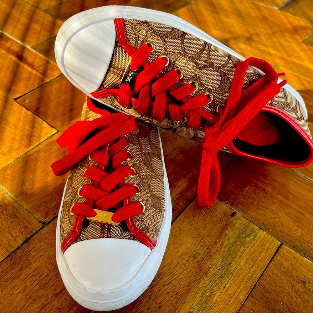 Coach Signature Jacquard Lace Up Closure Women Sneakers. Rubber outsole.